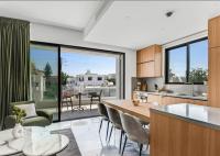 Kuchyň nebo kuchyňský kout v ubytování Olive Shared Pool Apartments
