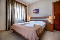 A bed or beds in a room at "Thea" Apartment 2