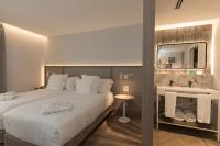 Posteľ alebo postele v izbe v ubytovaní Hotel Encinar de Sotogrande