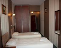 Posteľ alebo postele v izbe v ubytovaní Hotel Nad Rzeczką
