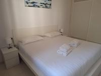 Posteľ alebo postele v izbe v ubytovaní Brisas Del Mar - Sunset Garden