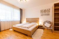 Posteľ alebo postele v izbe v ubytovaní Naturpark Chalets Lambrecht by ALPS RESORTS