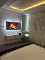 Postel nebo postele na pokoji v ubytování Luxueux appart-hotel