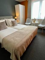 Boutique Hotel de la Ruïneにあるベッド