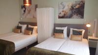 Boutique Hotel de la Ruïneにあるベッド