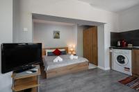 Postel nebo postele na pokoji v ubytování Cozy Apartment Green Terrace