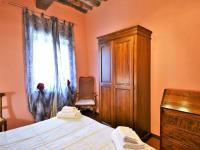 A bed or beds in a room at Rustic Holiday Home in Città di Castello with Swimming Pool