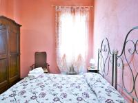 A bed or beds in a room at Rustic Holiday Home in Città di Castello with Swimming Pool