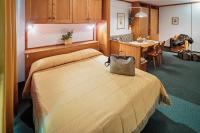 Posteľ alebo postele v izbe v ubytovaní Hotel Cristallino d'Ampezzo