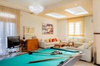 A seating area at Kallithea Breeze Luxury Villa