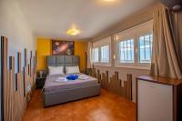A bed or beds in a room at Kallithea Breeze Luxury Villa