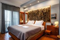 A bed or beds in a room at Kallithea Breeze Luxury Villa
