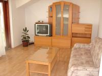 Televízia a/alebo spoločenská miestnosť v ubytovaní Apartments Tone