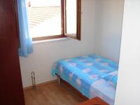 Posteľ alebo postele v izbe v ubytovaní Apartments Tone