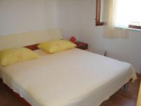 Posteľ alebo postele v izbe v ubytovaní Apartments Tone