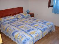 Posteľ alebo postele v izbe v ubytovaní Apartments Tone