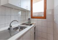 Kuchyňa alebo kuchynka v ubytovaní Apartment Ante M