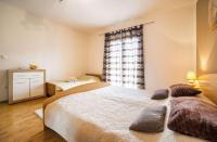 Posteľ alebo postele v izbe v ubytovaní Apartment Goge