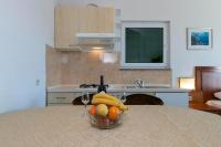 Kuchyňa alebo kuchynka v ubytovaní Apartments Marko