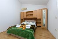 Posteľ alebo postele v izbe v ubytovaní Apartments Marko