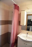 Kuchyň nebo kuchyňský kout v ubytování Apartments Ema