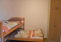 Postel nebo postele na pokoji v ubytování Apartments Ema