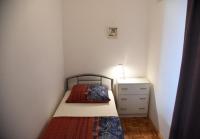 Postel nebo postele na pokoji v ubytování Apartments Ema