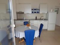 Kuchyň nebo kuchyňský kout v ubytování Apartments Sea front