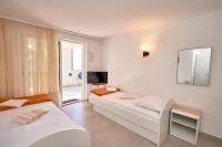 Postel nebo postele na pokoji v ubytování Apartments Sea front
