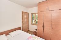 Postel nebo postele na pokoji v ubytování Apartments Sea front