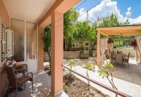 Vonkajšia záhrada v ubytovaní Apartment Dora