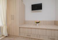 Televízia a/alebo spoločenská miestnosť v ubytovaní Apartment Dora