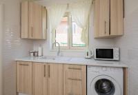 Kuchyňa alebo kuchynka v ubytovaní Apartment Dora