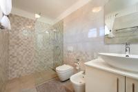 Kúpeľňa v ubytovaní Apartment Dora