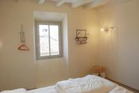 Posteľ alebo postele v izbe v ubytovaní La Corte - Theater Home