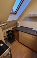Kuchyň nebo kuchyňský kout v ubytování Apartmán Husovka Bruntál - pokoj MATYAS