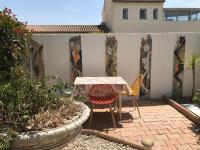 Ogród w obiekcie Appartement avec piscine - rez de jardin