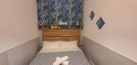 A bed or beds in a room at EN EL CORAZON DE GRANADA