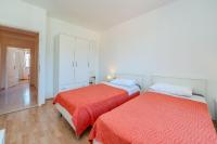 Posteľ alebo postele v izbe v ubytovaní Apartments Mlado