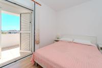 Posteľ alebo postele v izbe v ubytovaní Apartments Mlado
