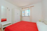 Posteľ alebo postele v izbe v ubytovaní Apartments Mlado