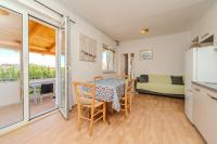Kuchyňa alebo kuchynka v ubytovaní Apartments Mlado