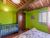 A bed or beds in a room at Rustic Holiday Home in Città di Castello with Swimming Pool