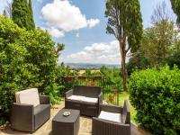 A seating area at Rustic Holiday Home in Città di Castello with Swimming Pool