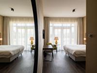 Ein Bett oder Betten in einem Zimmer der Unterkunft Hotel Ter Zand - Handwritten Collection