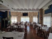 Reštaurácia alebo iné gastronomické zariadenie v ubytovaní Hotel Restaurante Setos