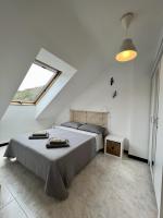A bed or beds in a room at Entre Montaña y Río Unquera