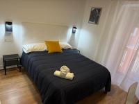 Posteľ alebo postele v izbe v ubytovaní Hostal ARS