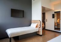 B&B HOTEL Paris Porte d'Orléansにあるベッド