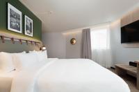 Campanile Prime Paris 19 - La Villetteにあるベッド